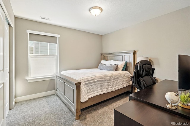 7949 S Elk Way, Aurora, CO 80016 - bedroom featuring light colored carpet and baseboards