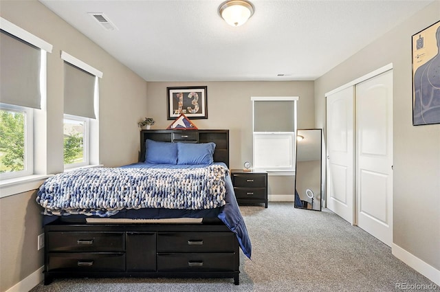 7949 S Elk Way, Aurora, CO 80016 - bedroom with carpet flooring and a closet