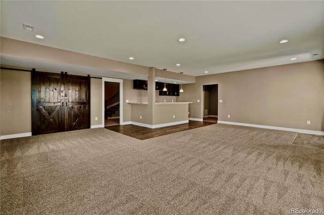 7949 S Elk Way, Aurora, CO 80016 - carpeted spare room with recessed lighting and stairway