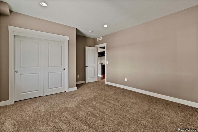 7949 S Elk Way, Aurora, CO 80016 - unfurnished bedroom with carpet floors, recessed lighting, and a closet