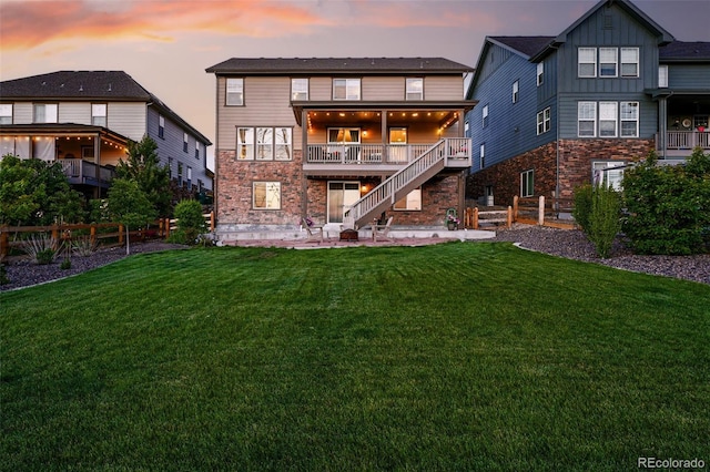 7949 S Elk Way, Aurora, CO 80016 - rear view of property with stairway, a patio area, and a wooden deck