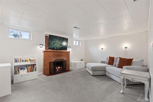 carpeted living room featuring visible vents and a fireplace