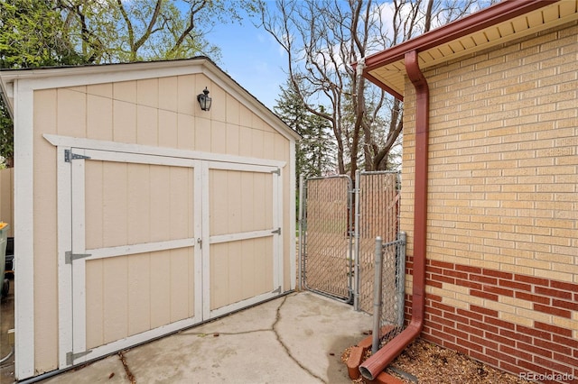 view of shed with a gate