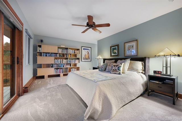 bedroom featuring access to exterior, carpet flooring, a ceiling fan, and baseboards