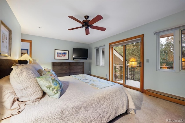 carpeted bedroom featuring access to outside, baseboards, baseboard heating, and a ceiling fan