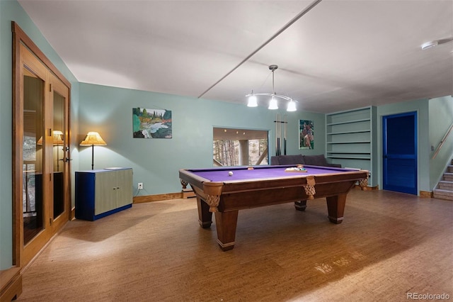 recreation room featuring baseboards, built in features, wood finished floors, and pool table