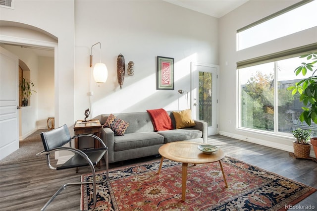 living room with dark wood-type flooring