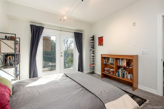 carpeted bedroom featuring french doors