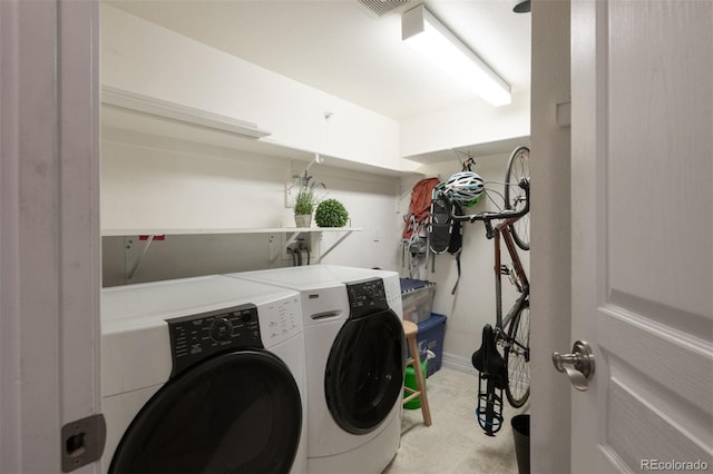 washroom featuring washing machine and dryer