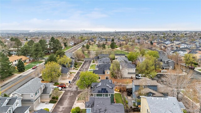 aerial view of property's location with nearby suburban area