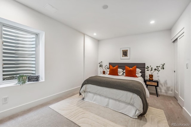 964 Quitman St, Denver, CO 80204 - bedroom featuring light carpet, baseboards, and recessed lighting