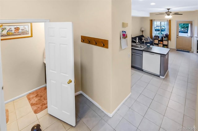 2143 Coronado Pkwy Unit C, Denver, CO 80229 - hall with a sink and light tile patterned floors