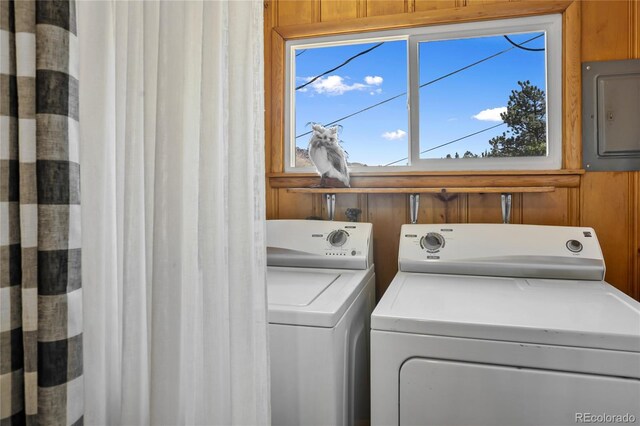 9850 Mohawk Trl, Cascade, CO 80809 - laundry room with washer and clothes dryer and electric panel