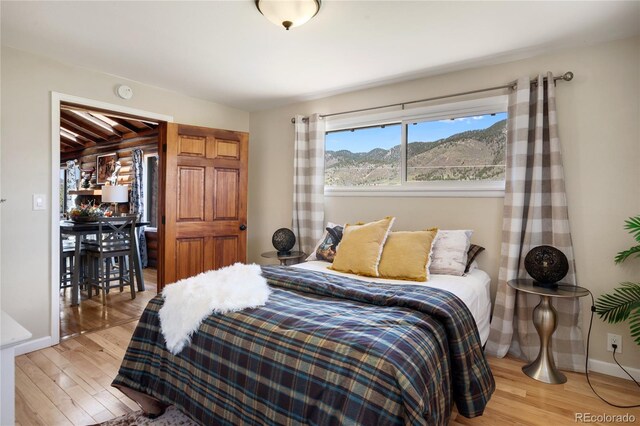 9850 Mohawk Trl, Cascade, CO 80809 - bedroom with light wood-type flooring and baseboards