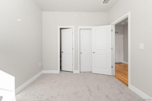 2828 N Federal Blvd, Denver, CO 80211 - unfurnished bedroom featuring light carpet and baseboards