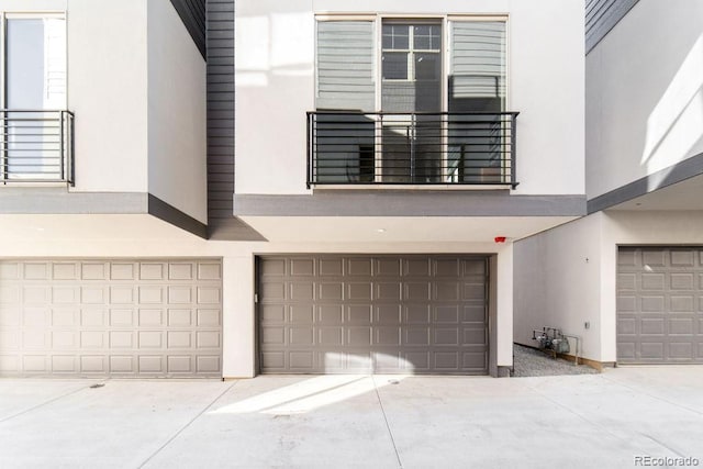 2828 N Federal Blvd, Denver, CO 80211 - view of front of property featuring stucco siding and a garage