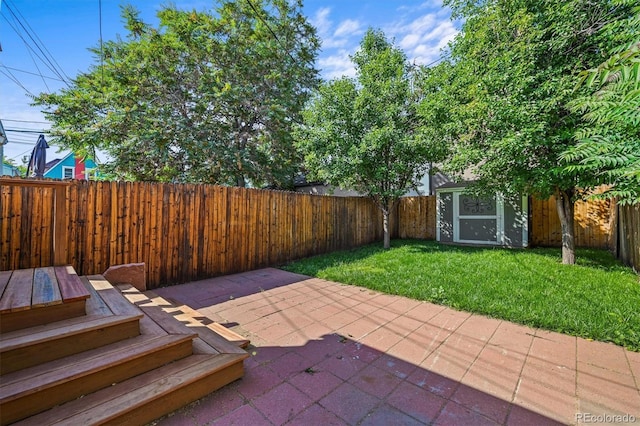 1024 34th St, Denver, CO 80205 - fenced backyard with a shed and a patio area