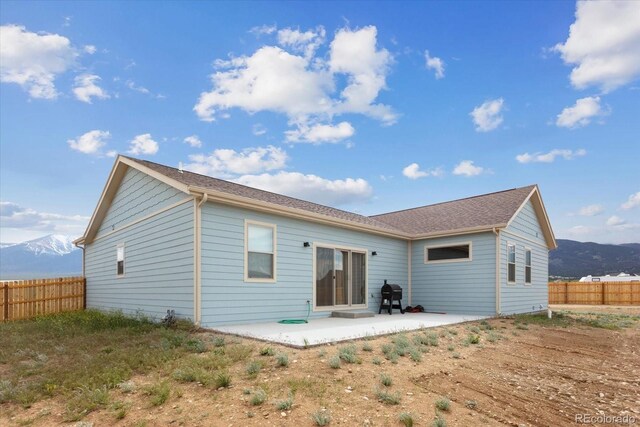 15626 Paintbrush St, Buena Vista, CO 81211 - back of house featuring a patio area and a mountain view