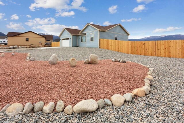 15626 Paintbrush St, Buena Vista, CO 81211 - view of yard featuring a garage