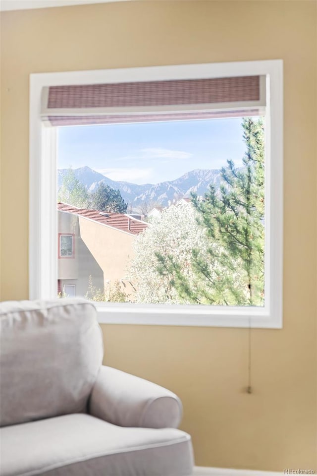 sitting room featuring a mountain view