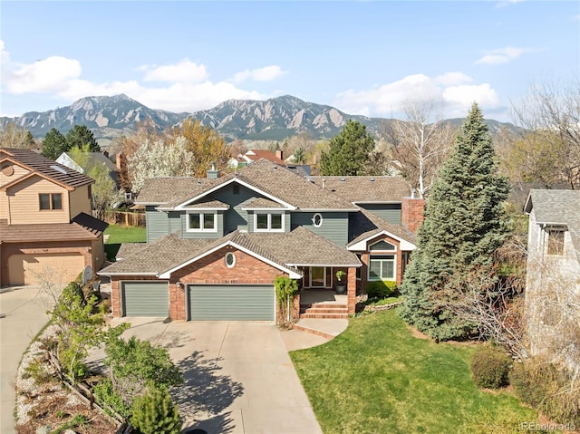 1437 Cassin Ct, Boulder, CO 80303 - view of front of property featuring driveway, a front lawn, brick siding, a porch, and a mountain view
