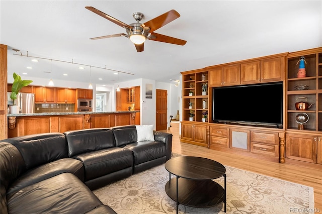 1437 Cassin Ct, Boulder, CO 80303 - living area featuring ceiling fan, track lighting, and light wood-type flooring