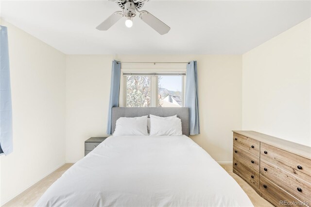 1437 Cassin Ct, Boulder, CO 80303 - bedroom featuring light colored carpet, ceiling fan, and baseboards