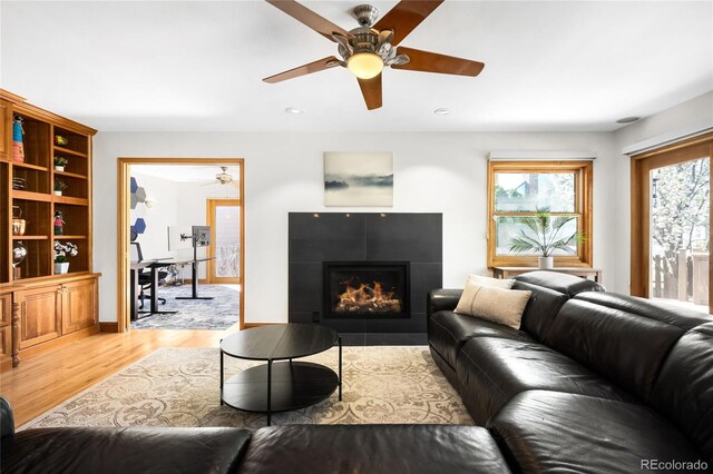 1437 Cassin Ct, Boulder, CO 80303 - living area with ceiling fan, light wood-style floors, a fireplace, recessed lighting, and baseboards