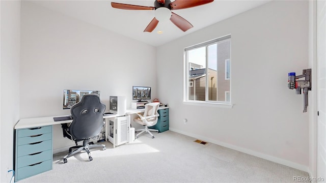 office featuring ceiling fan and carpet flooring