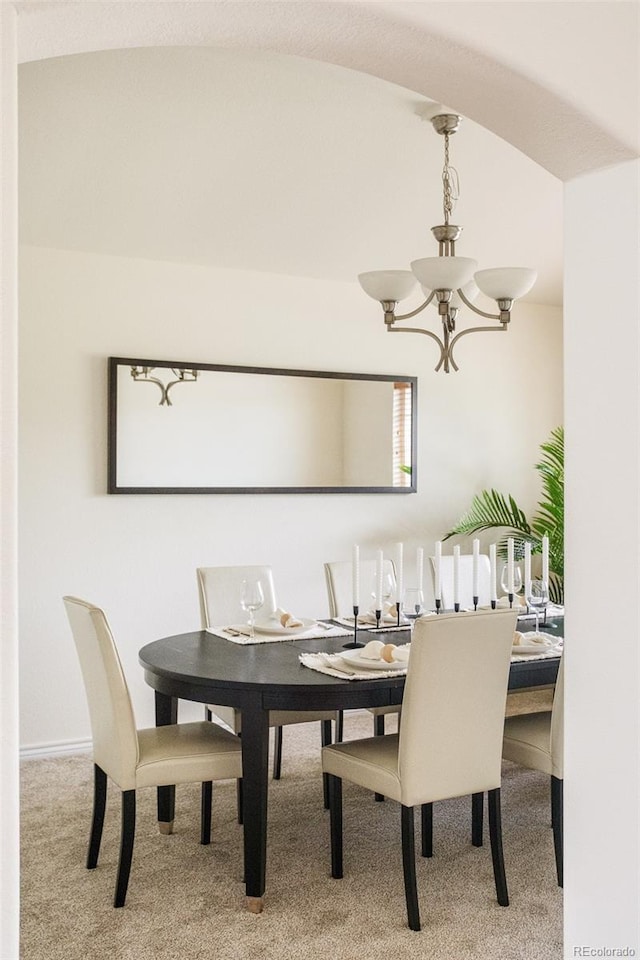 1477 Serene Dr, Erie, CO 80516 - dining area with a chandelier and carpet floors