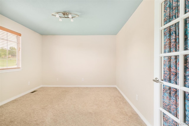 1477 Serene Dr, Erie, CO 80516 - spare room featuring carpet and baseboards