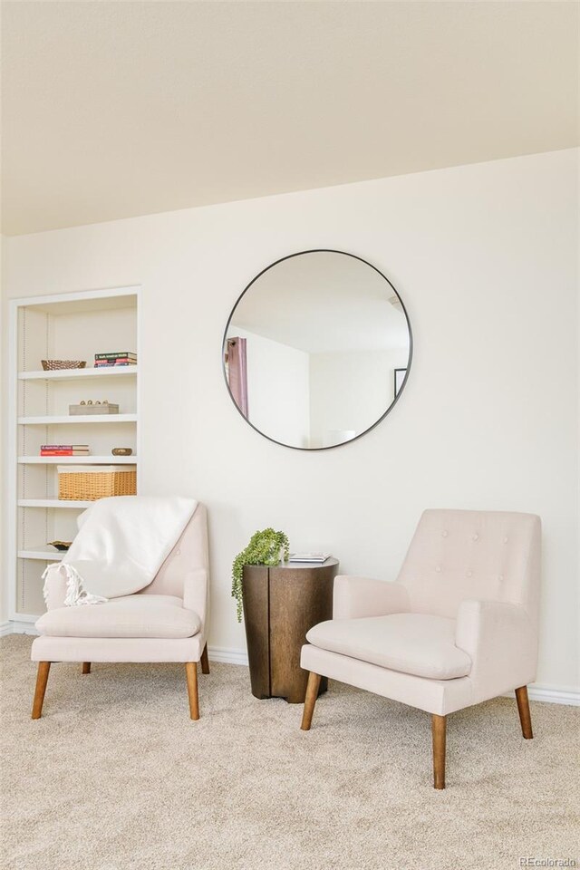 1477 Serene Dr, Erie, CO 80516 - living area featuring carpet floors and baseboards