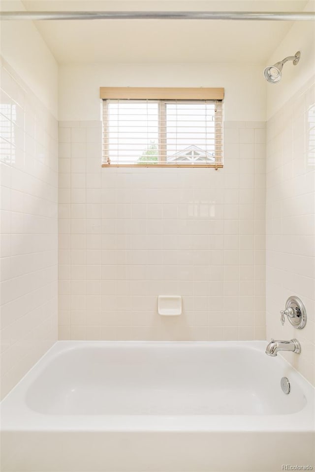 1477 Serene Dr, Erie, CO 80516 - full bath featuring plenty of natural light and shower / bath combination