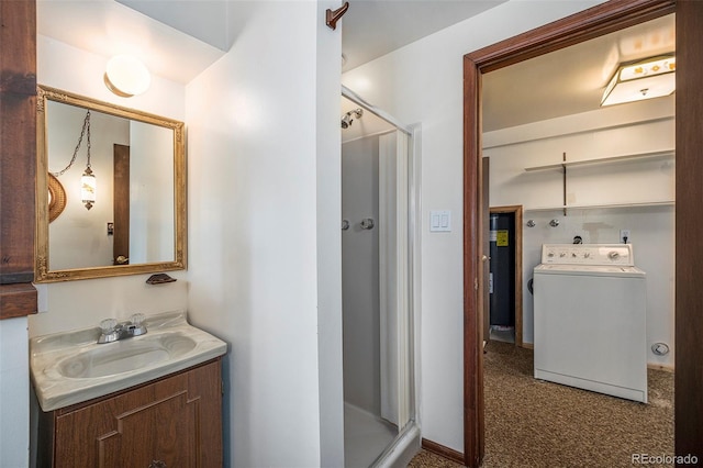 full bath with washer / clothes dryer, a shower stall, and vanity