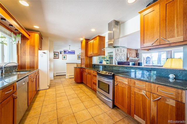 kitchen featuring stainless steel appliances, sink, ventilation hood, and plenty of natural light