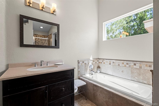 1376 Banner Cir, Erie, CO 80516 - bathroom featuring vanity, a garden tub, and a shower