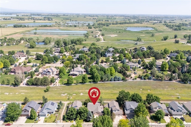 1376 Banner Cir, Erie, CO 80516 - aerial view of residential area with a large body of water