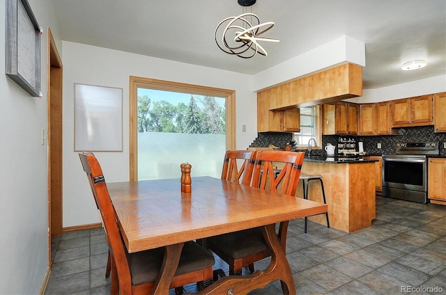 510 Crossman Ave, Buena Vista, CO 81211 - dining room with a chandelier and dark stone finish flooring