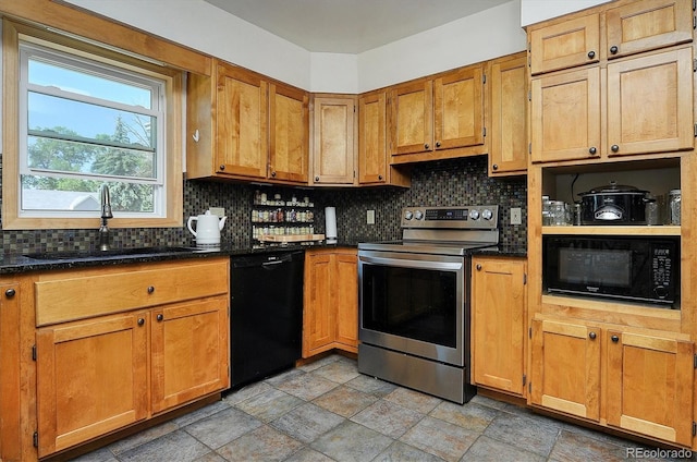 510 Crossman Ave, Buena Vista, CO 81211 - kitchen with black appliances, tasteful backsplash, light stone finish floors, and brown cabinetry