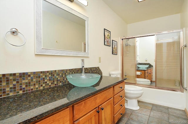 510 Crossman Ave, Buena Vista, CO 81211 - bathroom featuring decorative backsplash, vanity, and enclosed tub / shower combo
