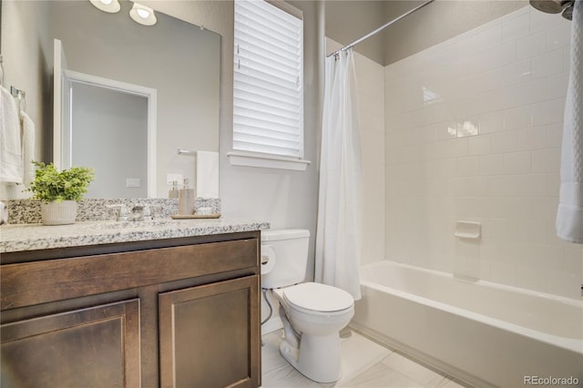 bathroom featuring shower / tub combo, vanity, and toilet