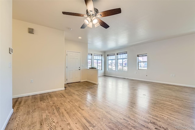 12625 Madison Way, Thornton, CO 80241 - spare room with light wood-style flooring, ceiling fan, and baseboards