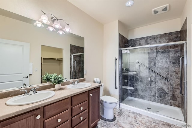 12625 Madison Way, Thornton, CO 80241 - full bath featuring a shower stall, double vanity, a sink, and visible vents