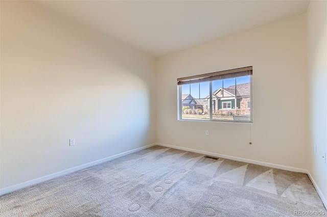 12625 Madison Way, Thornton, CO 80241 - spare room with visible vents, baseboards, and light colored carpet