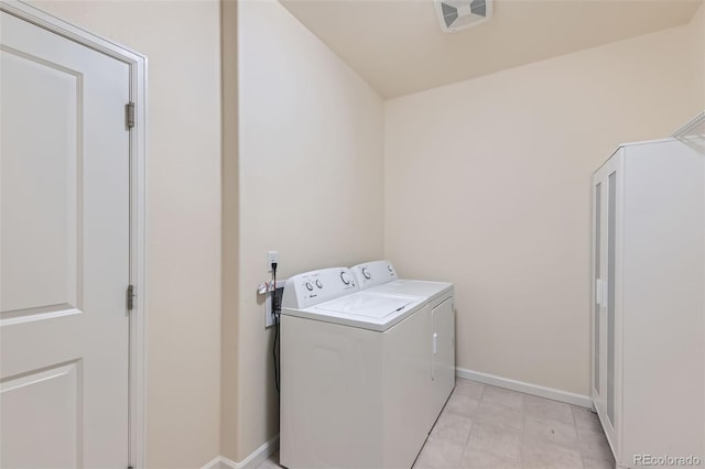 12625 Madison Way, Thornton, CO 80241 - washroom with separate washer and dryer, laundry area, baseboards, and visible vents