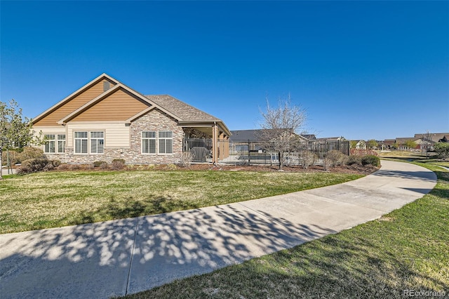 12625 Madison Way, Thornton, CO 80241 - single story home with fence, stone siding, and a front lawn