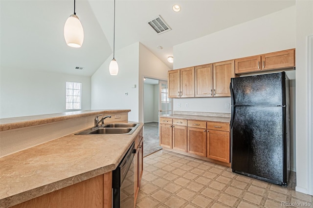 2552 W 82nd Ln Unit C, Westminster, CO 80031 - kitchen featuring black appliances, vaulted ceiling, healthy amount of natural light, decorative light fixtures, and light floors