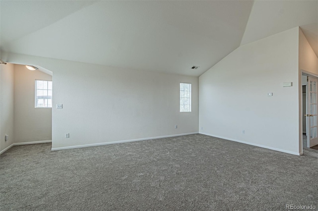 2552 W 82nd Ln Unit C, Westminster, CO 80031 - carpeted spare room featuring vaulted ceiling and baseboards