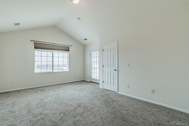 2552 W 82nd Ln Unit C, Westminster, CO 80031 - empty room with carpet flooring and vaulted ceiling