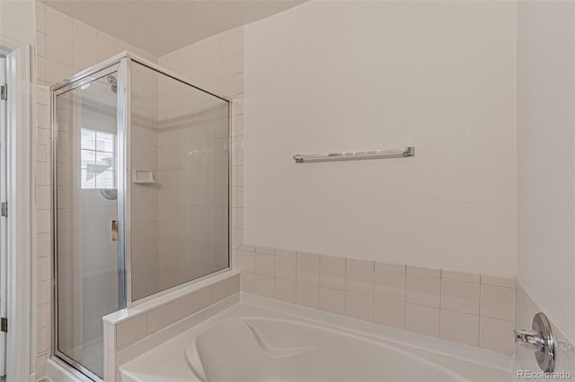 2552 W 82nd Ln Unit C, Westminster, CO 80031 - bathroom featuring a shower stall and a bath
